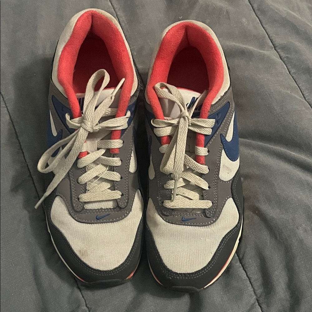 Nike Gray and Blue Athletic Shoes with Red Accents